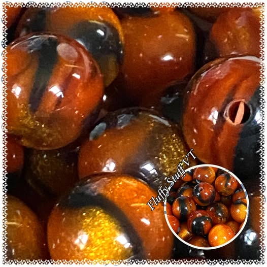 16mm classic tiger eye. This resin bead is a beautiful beast!!