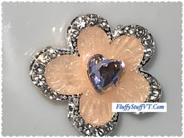 18mm rhinestone and enamel four hole metal bead.