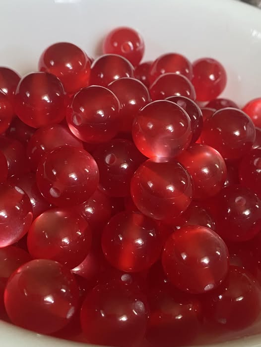 16mm jelly red cats eye resin bead.