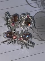 12mm metal spider and gem four hole bead.