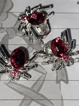 12mm metal spider and gem four hole bead.