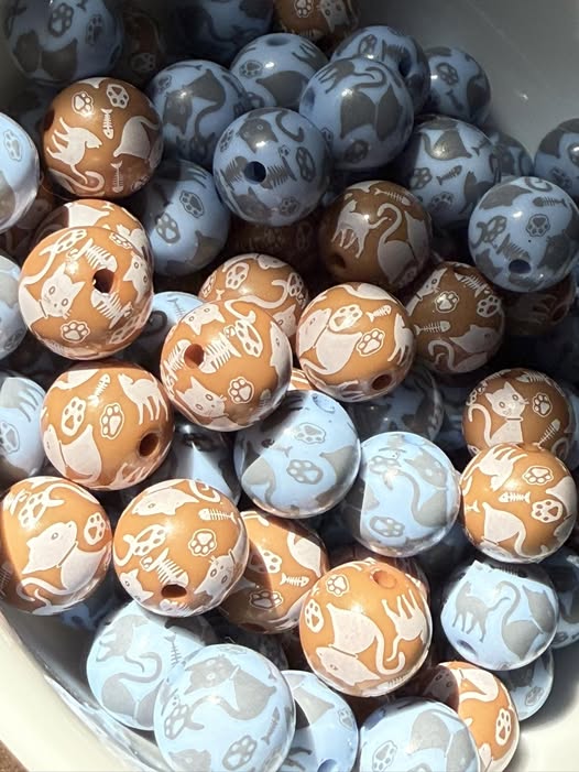 16mm kitty printed beads.