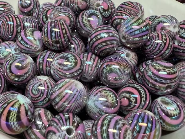 16mm pink and black uv coated bead.