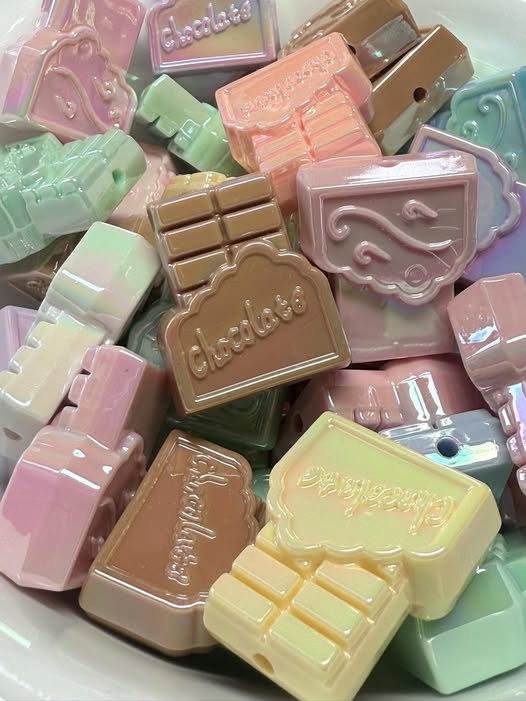 32mm chocolate bar bead with a ab glaze.