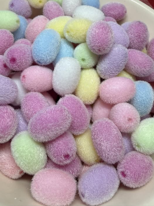 16mm fuzzy egg shaped beads.