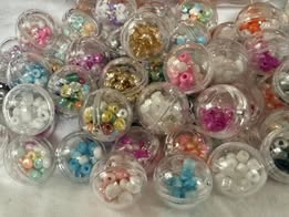 clear 20mm beads filled with seed bead shaker
