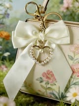 Satin bow with metal and pearl heart purse bow