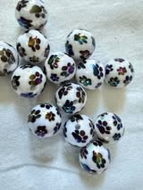 16mm paw print bead with white base