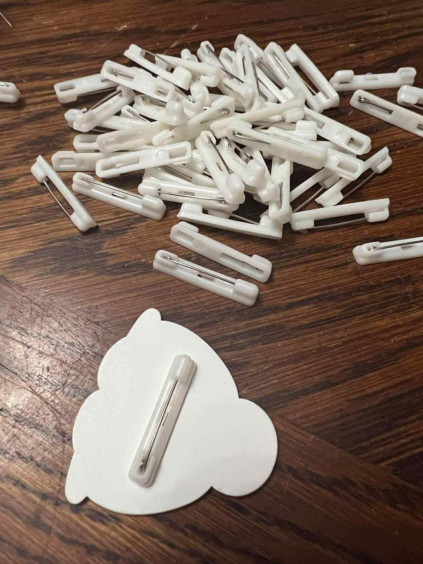 flat back pins.