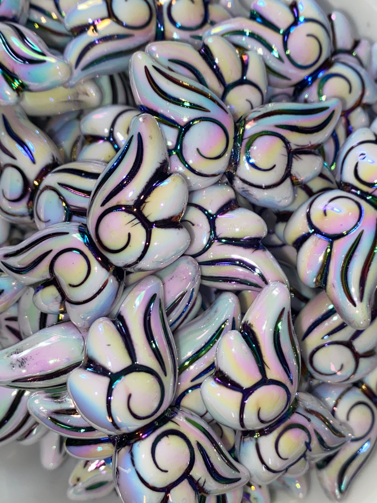 22mm black uv coated swirl wing bead