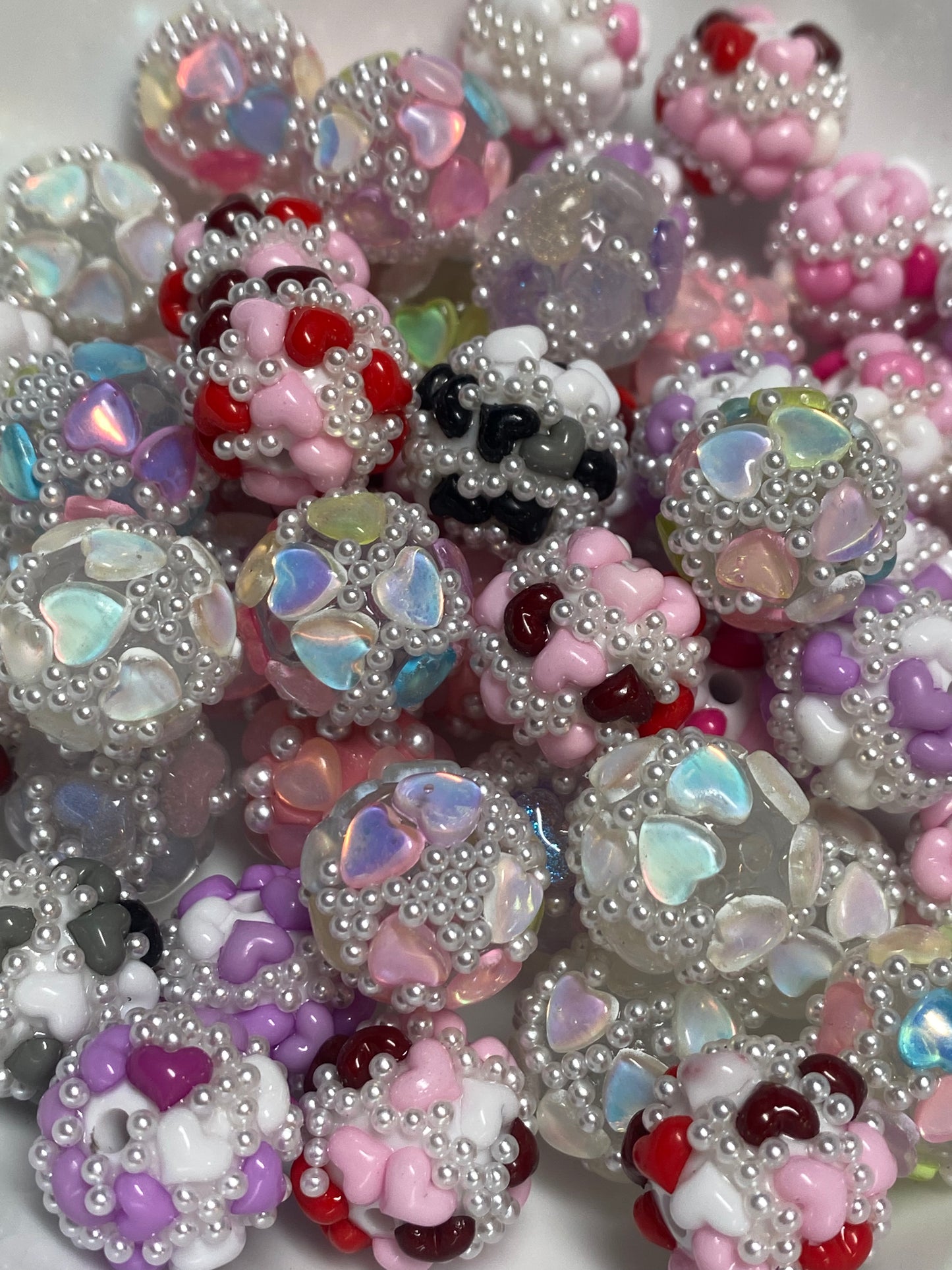 16mm special hand rolled hearts with pearl beads.