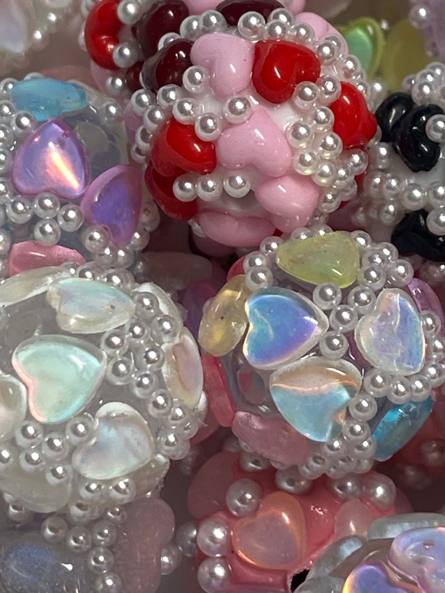 16mm special hand rolled hearts with pearl beads.