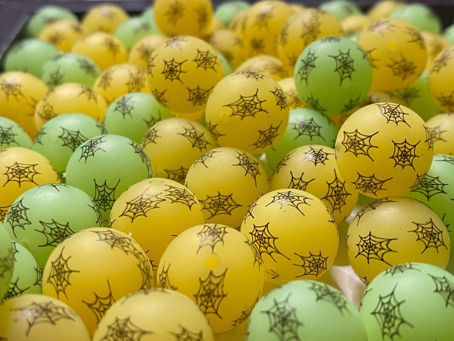 Green and orange spiderwebs silicon beads
