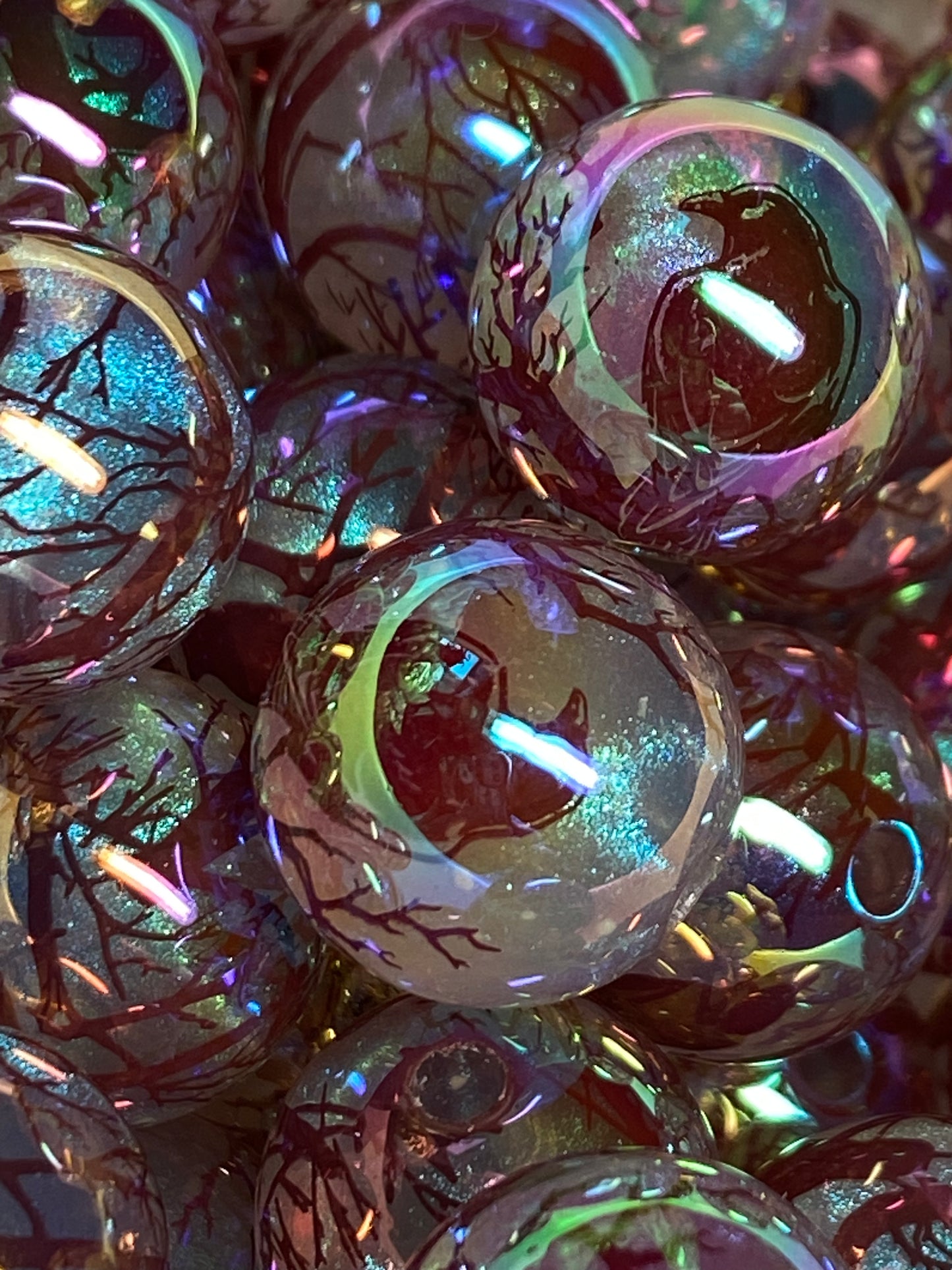 16mm Raven in red galaxy bead