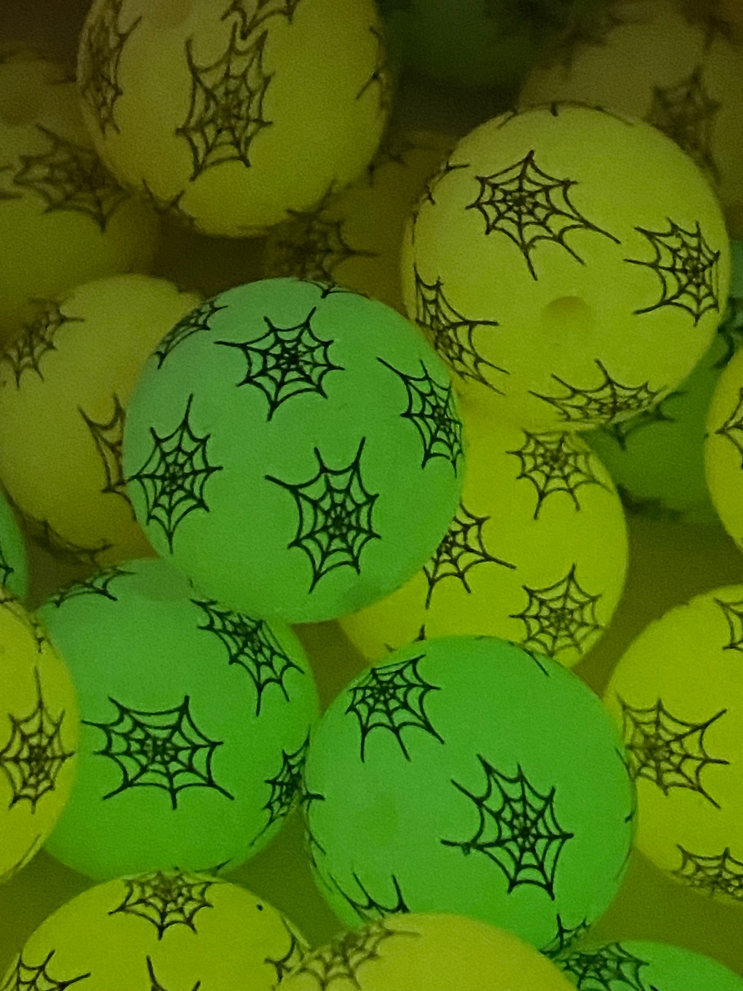 Green and orange spiderwebs silicon beads