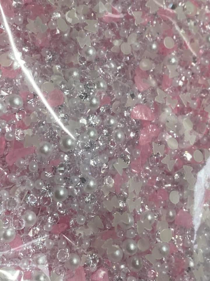 Acrylic sugar crystals for decorating your own pens,fancy beads, journal pages. Hair bands and so much more. Try using it on a bookmark!