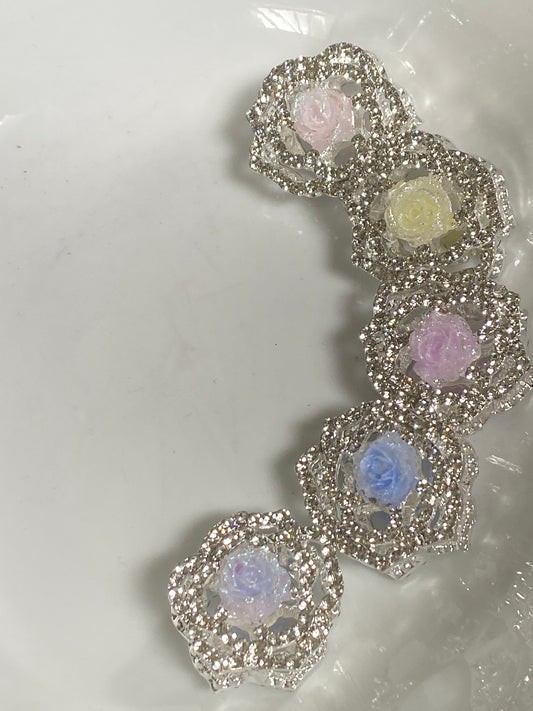 20mm metal four hole rhinestone encrusted bead with a soft rose bud