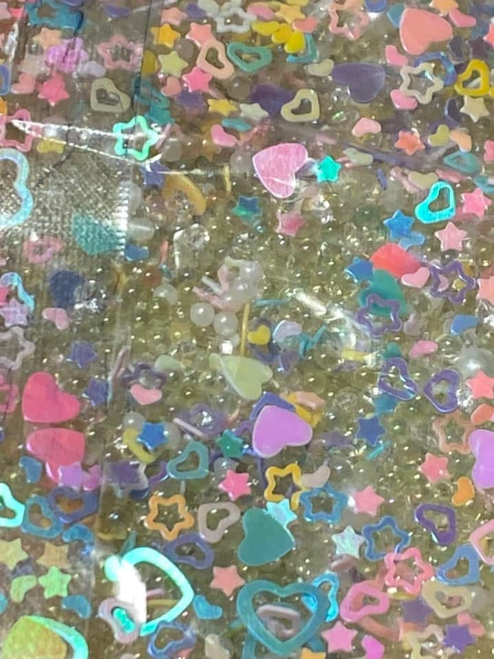 Acrylic sugar crystals for decorating your own pens,fancy beads, journal pages. Hair bands and so much more. Try using it on a bookmark!