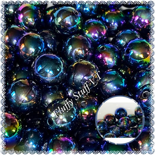 16mm oil slick bead. This basic bead goes with most everything. Says lumi but very light.