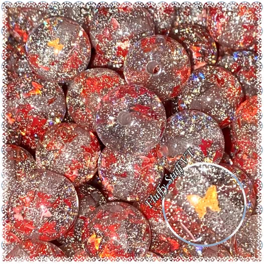 16mm silver glitter filled resin bead with chunky pink metallic butterflies.