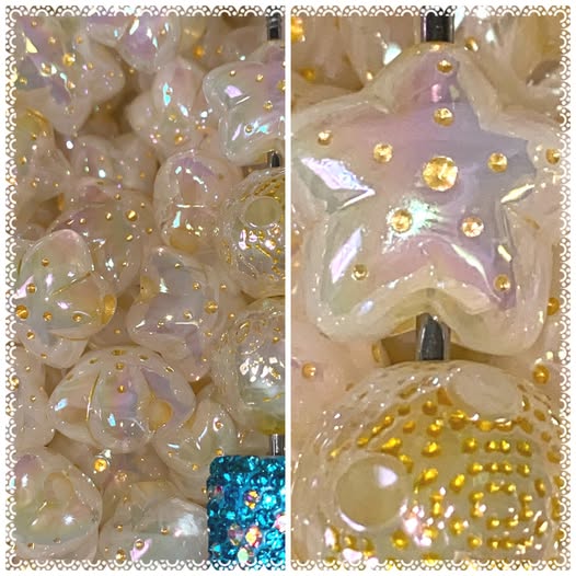 16mm chunky ivory stars with gold embellishment.