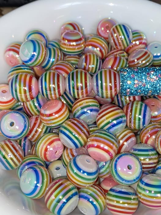 AB coated rainbow with a white base bead