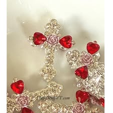 30mm beautiful gem filled metal cross with soft rose.