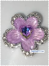 18mm rhinestone and enamel four hole metal bead.