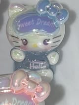 32mm glow HK sitting “hello”.