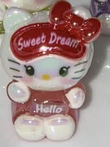 32mm glow HK sitting “hello”.