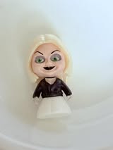 3d figures w/little stand and hole in one foot.