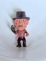 3d figures w/little stand and hole in one foot.