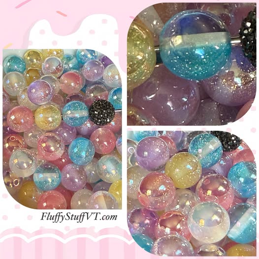 16mm gold uv finish 1/2 cats eye clear and 1/2 galaxy.