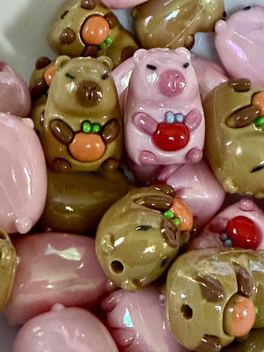 26mm glossy rubber capybara beads.