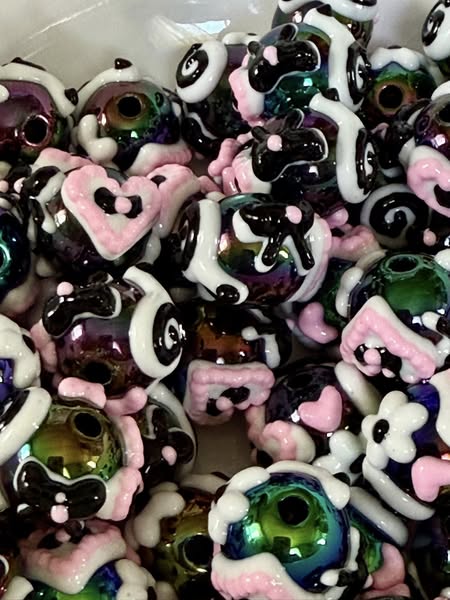 14mm hand painted oil slick bead. This is a cute one.