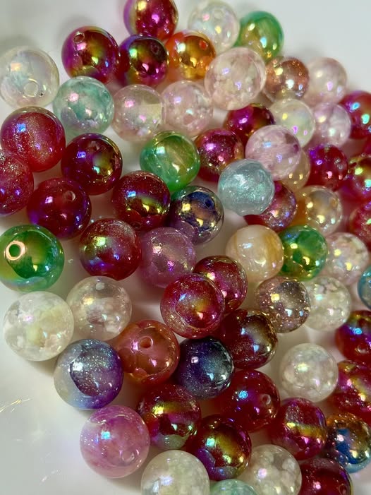 16mm loose bead mix: galaxy, cloud filled, cat’s eye, and glitter.