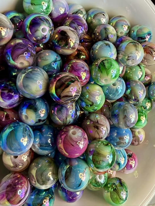 16mm bright UV coated mixed marble bead.