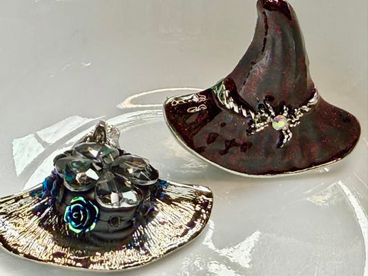55mm black with crimson glitter witches hat with a rhinestone spider.