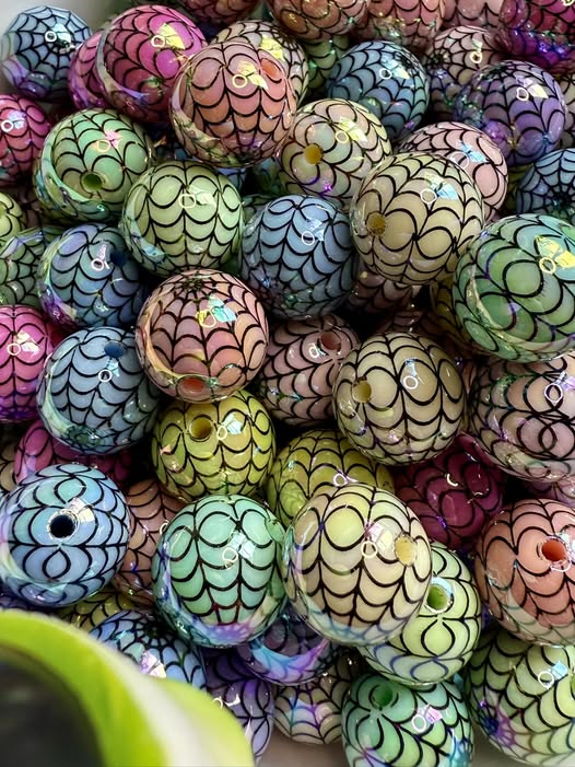 16mm uv coated shiny cobweb bead.