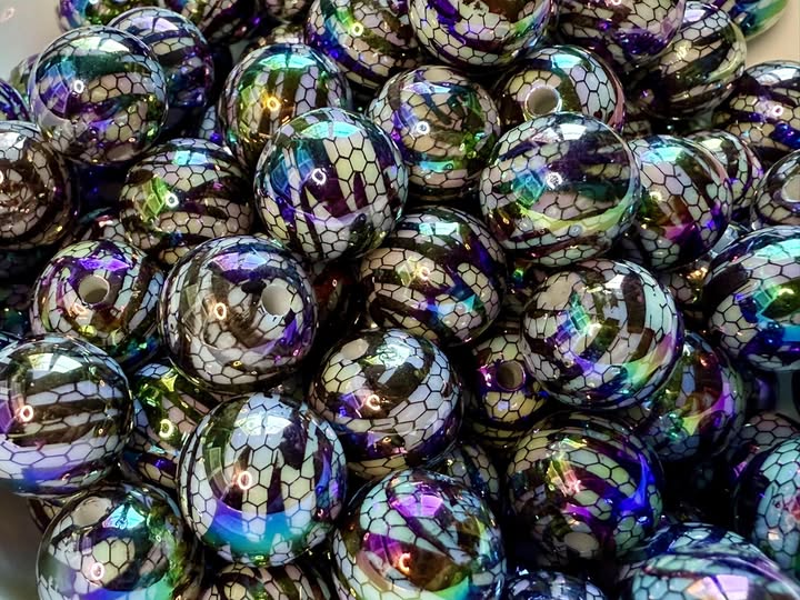 16mm animal print lace with a lovely uv coating.bead