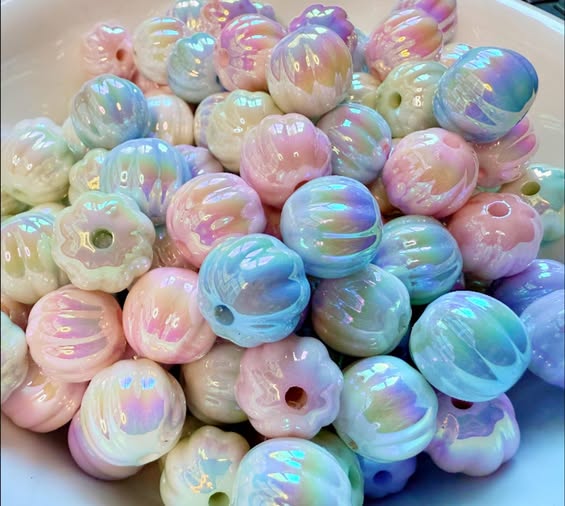 14mm twisted pumpkin uv coated pastel beads.