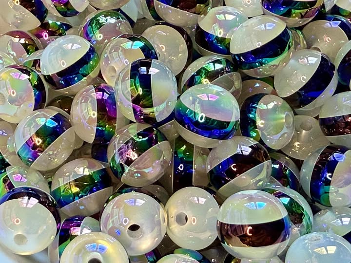 16mm white cats eye with oil spill center.