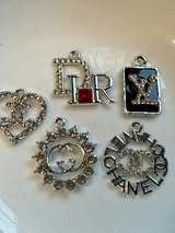 Designer metal charms