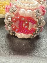 High end hand made designer CC with rhinestone, flower, and pearl beads.