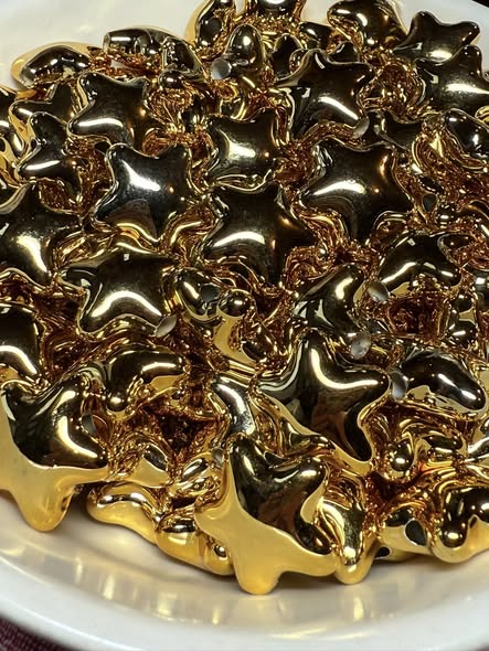 Metallic gold color stars