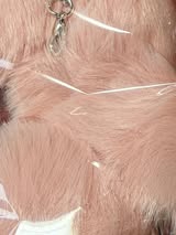 2.5” fluffy pompom with chain and lobster claw hardware.