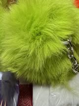 2.5” fluffy pompom with chain and lobster claw hardware.