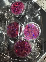 Retractable metal beadable badge reel with holographic glitter.