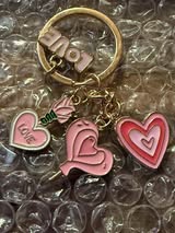 Key rings with metal charms.