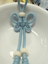 8.5” tied rope charms